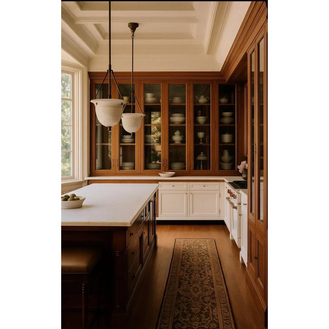 This large scale alabaster pendant is suspended by three wrought-iron rods creating a balance of strength and softness,...