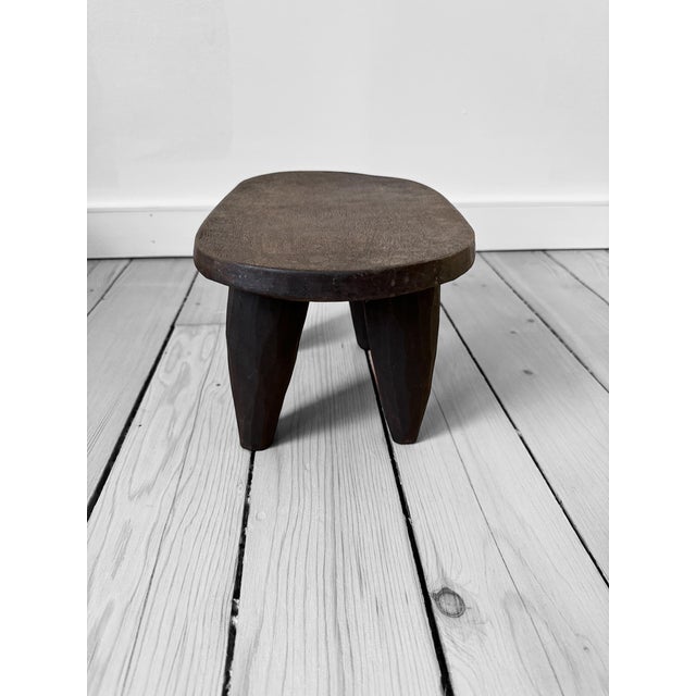 The Senufo stool is a stunning example of eclectic decor, seamlessly blending traditional craftsmanship with modern...