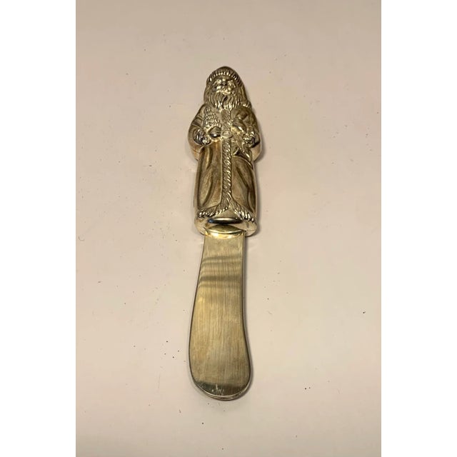 Vintage silverplate santa butterknife by Godinger. Circa 1970s.