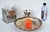 W. M Rogers Vintage Silver Plate clam shell serving dish with an integrated dip cup, crafted in a scalloped design with...