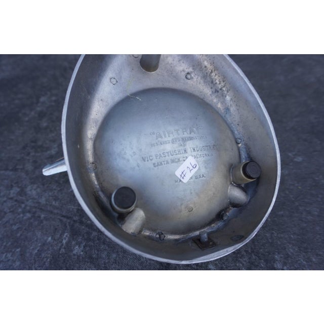 "Air Tray" manufactured by Victor F. Pastushin Santa Monica, CA on its underside. Measures 6" tall x 9" long x 8 1/4" wide.