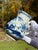 An antique Worcester soft-paste porcelain cream jug from the late 18th century, decorated in the blue-and-white Fence...