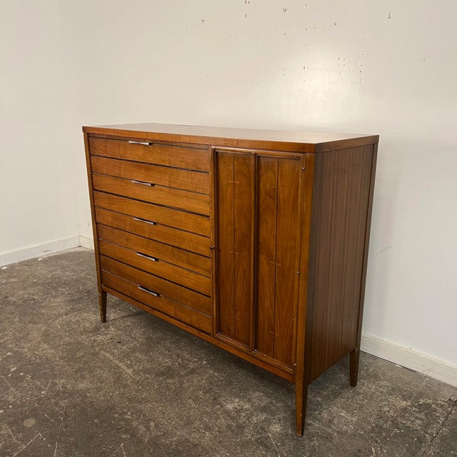 for Lane, this gentleman’s chest features 5 drawers on the left side of the piece and a door that opens to reveal more...