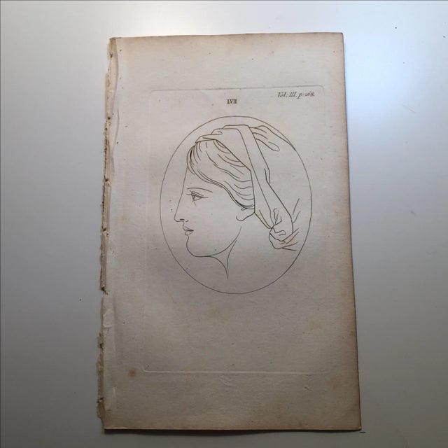 Antique engraving of a woman in profile. Plate number LVII, vol. III, p. 268. Toned paper has minor foxing and a few tiny...