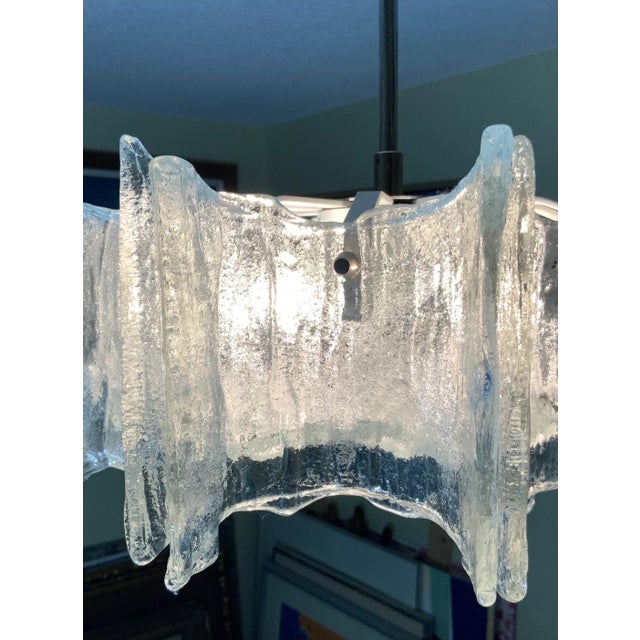 Beautiful vintage chandelier made in Austria and curved texture glass plates with star like glass bottom. Chrome hardware....