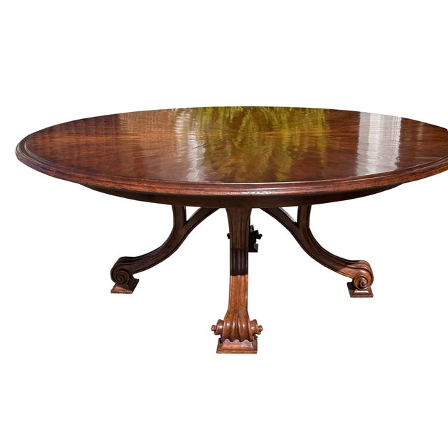 Therien Workshops for Dessin Fournir Round Volute Walnut Extension Dining Table. It is an unusual example with exterior...