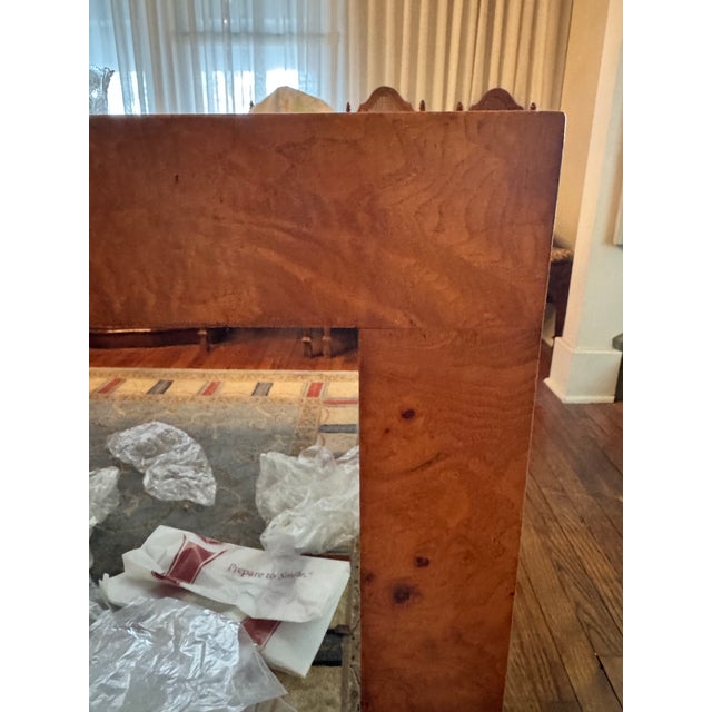 Offered is a monumental, museum-quality vintage American burl-wood extension dining table, confidently attributed to...