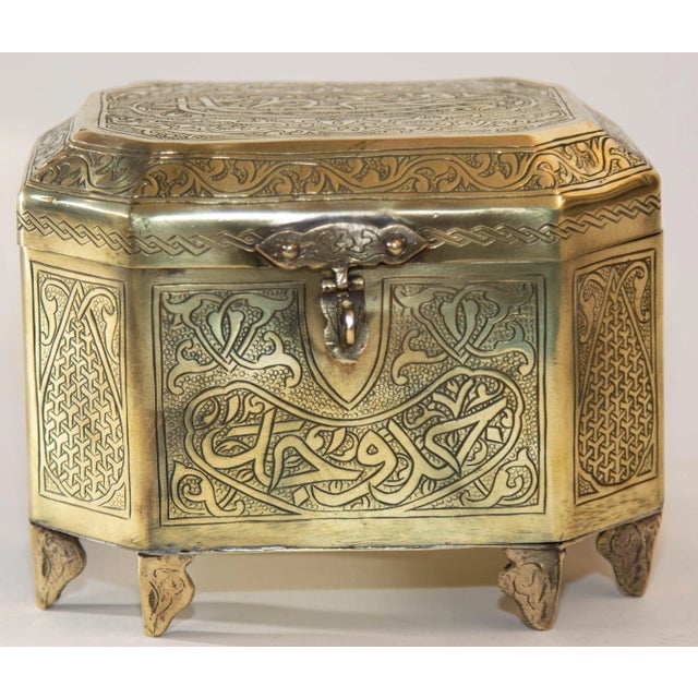 Antique Persian Islamic Brass Jewelry Footed Box in Mamluk Revival Damascene style. A Middle Eastern Moorish Damascene...