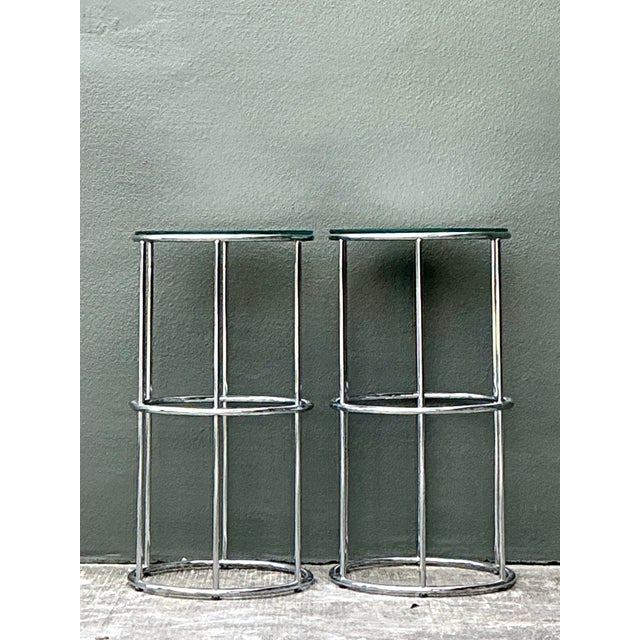 This striking pair of vintage pedestals is a quintessential example of Mid-Century Modern High-Tech design, offering a...