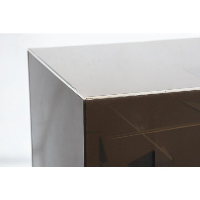 A vintage lucite postmodern table sculpture. This is a very unique sculpture featuring smoked lucite sides, and clear top...