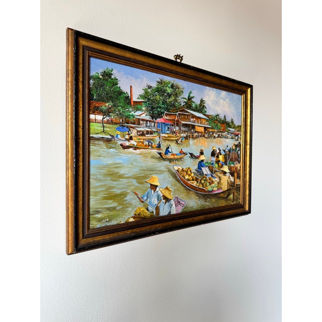 This captivating 1974 vintage oil painting by Sam Ruey beautifully captures the vibrant energy of a traditional Asian...