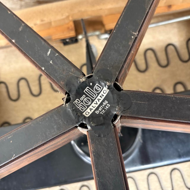 Mid century modern Scandinavian Lounge Chair on Rosewood Base with the tag Soda Galvano brattvag on the bottom swivel...