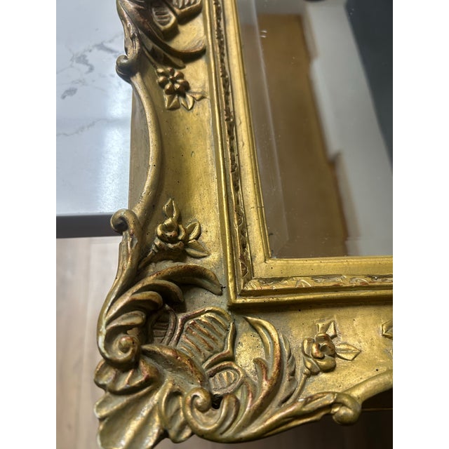 Gorgeous, oversized ornate wall mirror in a classic French Baroque/Louis XV style. This is a high-quality vintage piece,...