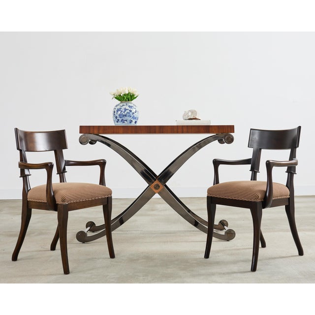 Amazing neoclassical style console table or center table featuring an X form curule leg. base crafted from thick iron. The...