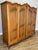 This elegant Vintage French Louis wardrobe presents a beautifully shaped silhouette with flowing lines, ornate carved...