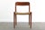 Gorgeous and Iconic Moller Side chair. Solid rich grained teak with original cord. Both comfortable and built to last!