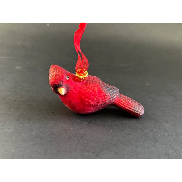 This red cardinal bird glass ornament is a Christmas holiday decor classic. The vintage glass ornament is in good...