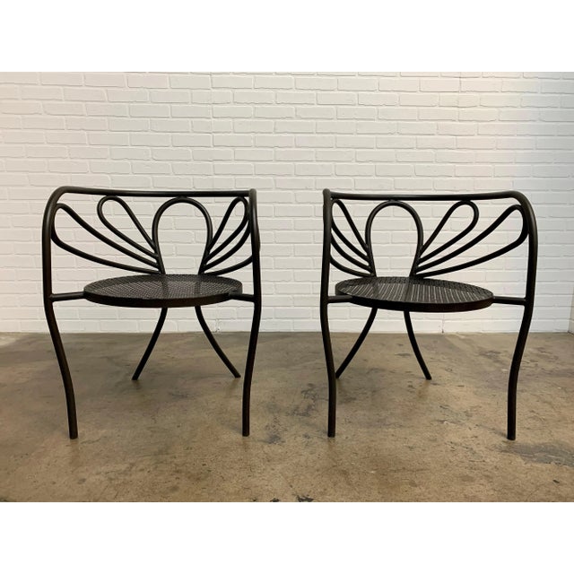 Pair of bronze powder-coated steel armchairs by California Designer Walter Coons for Clark & Burchfield. Seat height: 16in.