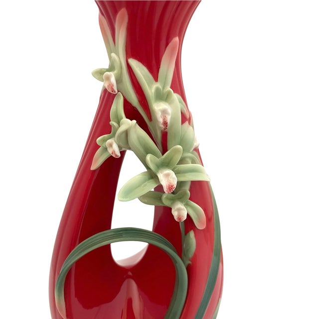 The Franz Faber Cymbidium Vase FZ03036 Happy Shen Yong 2013 Privilege Club is a beautifully handcrafted porcelain vase...