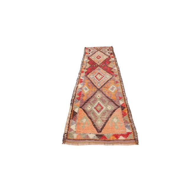 Handknotted vintage decorative Herki runner from Northern Iraq. Approximately 50-60 years old. In very good condition.