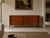 Edmond Spence, Swedish Mid-Century Modern, Concave Dresser, Stained Wood, Brass, Sweden, 1950s A unique dresser designed...