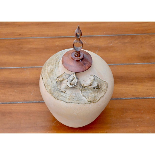 Vintage Organic Modern studio pottery lidded vessel in ceramic, signed by its unidentified artist. Its sculptural form and...