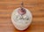 Vintage Organic Modern studio pottery lidded vessel in ceramic, signed by its unidentified artist. Its sculptural form and...