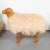 Large highly detailed woodcarving sculpture with faux shearling depicting a sheep by master woodworker Carlos Villegas....