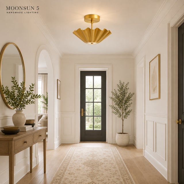 Bring timeless elegance into your home with this handcrafted scalloped brass flush mount ceiling light — a perfect blend...