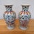 A delightful pair of hand-painted porcelain vases by Altfield Hong Kong, featuring whimsical chinoiserie decoration in a...