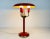 An Italian table lamp made in the 1960s. Made or metal and brass. The lighting has an exceptional design with 3 arms. The...