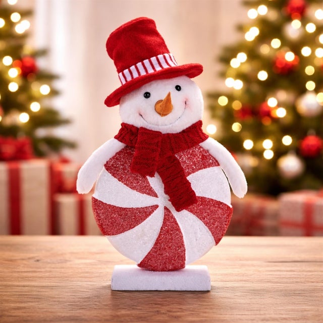 Sweeten your holiday décor with this Peppermint Snowman Figurine with Red Hat. Designed with a whimsical peppermint swirl...