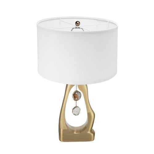 This modern and captivating table lamp features a geode-like gold aluminum body, a classic white cylindrical lampshade,...