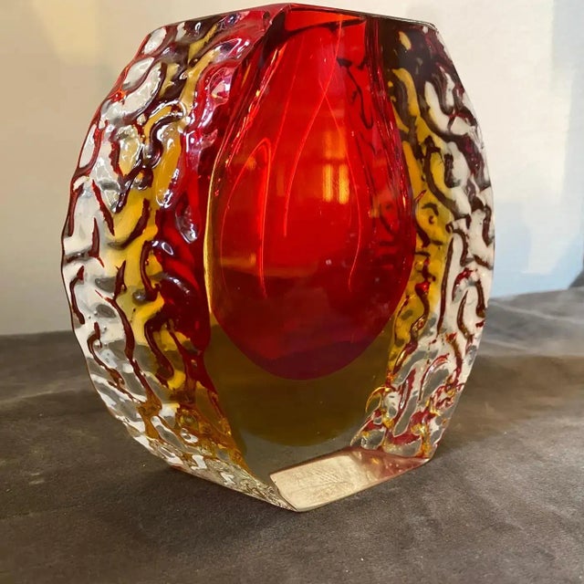 A red and yellow sommerso murano glass vase designed and manufactured in Venice in the Sixties by Mandruzzato in perfect...