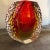 A red and yellow sommerso murano glass vase designed and manufactured in Venice in the Sixties by Mandruzzato in perfect...