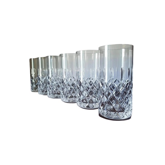 A classic set of six Mid-Century Mikasa Coventry crystal highball glasses, featuring the iconic diamond-cut crisscross...