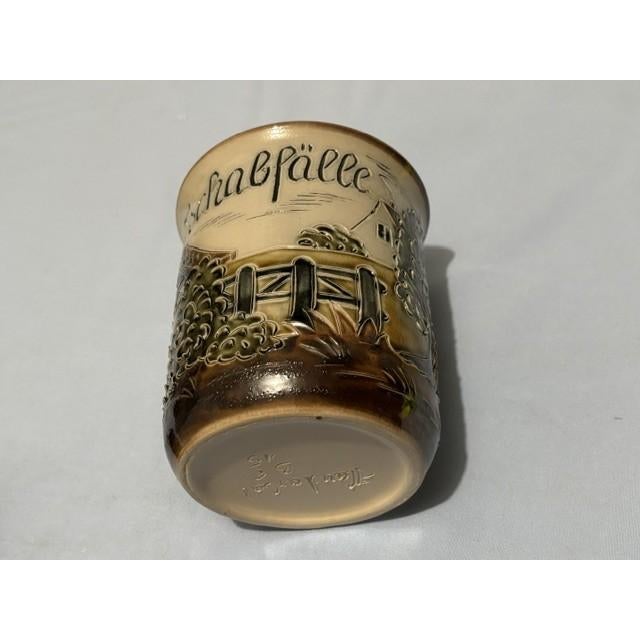 unique ceramic Gorgeous handmade decorative container placed on a dining room table for people to put trash in it (during...