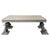 Bronze Figural Coffee Table with Travertine Top A unique and sculptural bronze coffee table featuring a pair of cast...