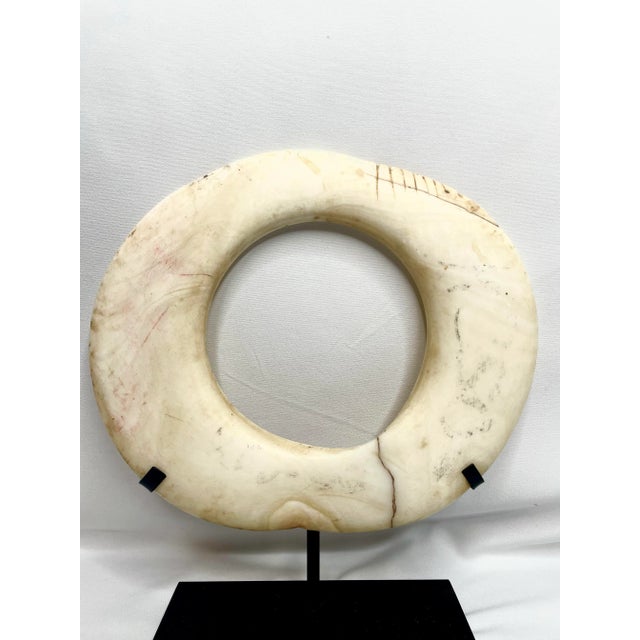 A group of 17th and 18th century currency shell rings from Papua New Guinea. Carved from the Tridacna Gigas, or giant clam...