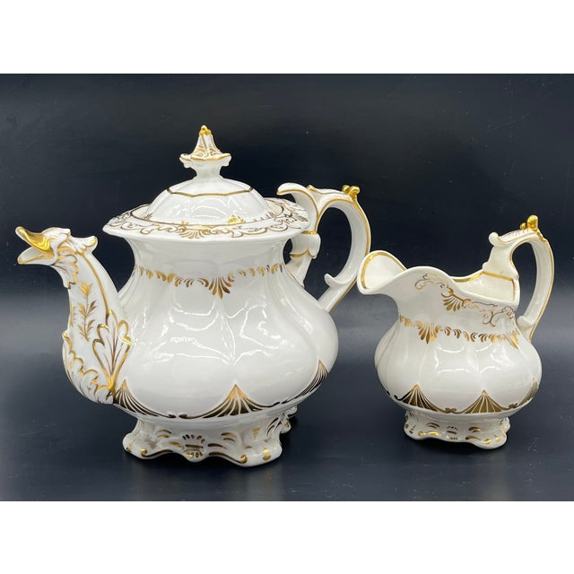 This magnificent porcelain set from Davenport consists of an artfully crafted teapot and a matching creamer. Both pieces...