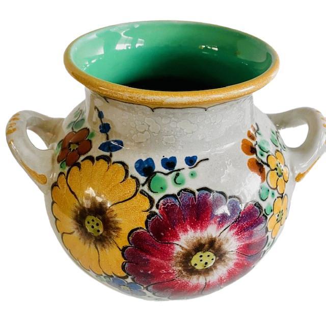 Large Royal Gouda Zuid-Holland vase with handles, floral Areo design from the 1940s. The vase is marked on the bottom with...