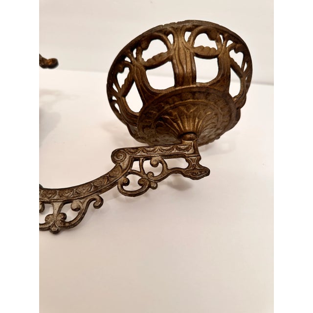 Antique Cast Iron Wall Candle Sconce Early 20th century cast iron wall candle sconce. Grey paint wear gives rustic decor...