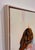 Flare presents a close-up view of a figure from behind, showcasing a textured interplay of soft, muted colors that evoke a...