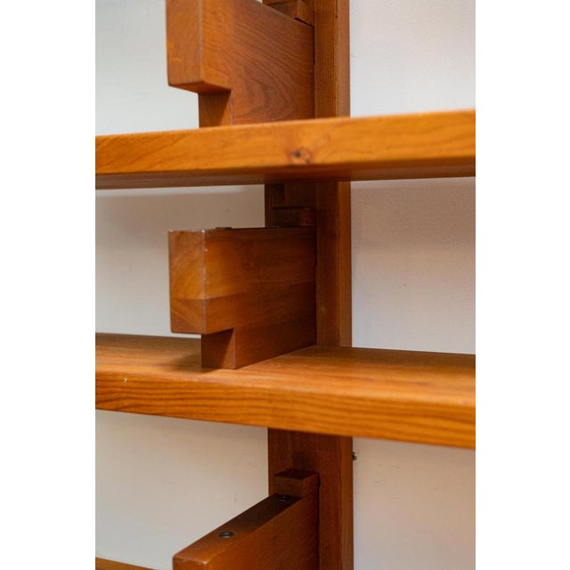 Pierre Chapo. Wall shelf or bookcase, model B17, in natural light elm. Technical feature of this model: supports mounted...