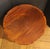 Early 20th century revolving bookcase side table, English. Lobed surfaces. Mahogany with mahogany crossbanding. Raised on...