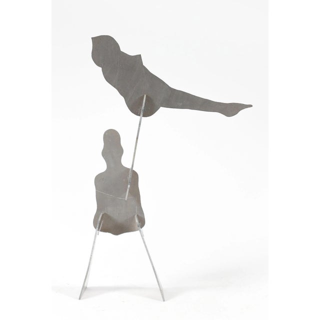 The Test (1970) Man holding a woman steel sculpture with attachable pieces by William King. signed with cipher, numbered...