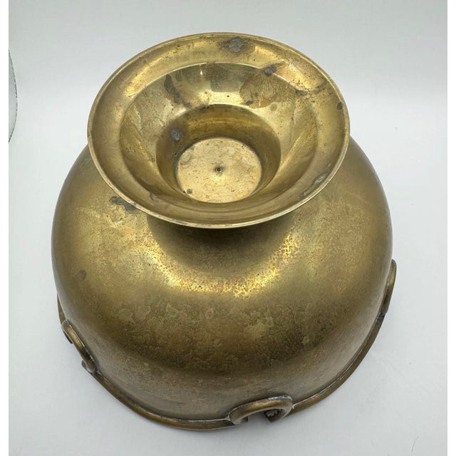 This fabulous 1970s Scalloped Edge Solid Brass Pedestal Bowl / Planter will be an eye-catching element on your bookshelf...