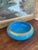 A fine example of 19th-century French opaline glass, this vibrant sky-blue bowl showcases the luminous, semi-translucent...
