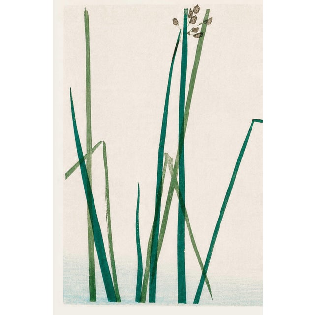 A refined example of traditional Japanese woodblock art, this vintage art print reproduction features Dragonfly on Bulrush...