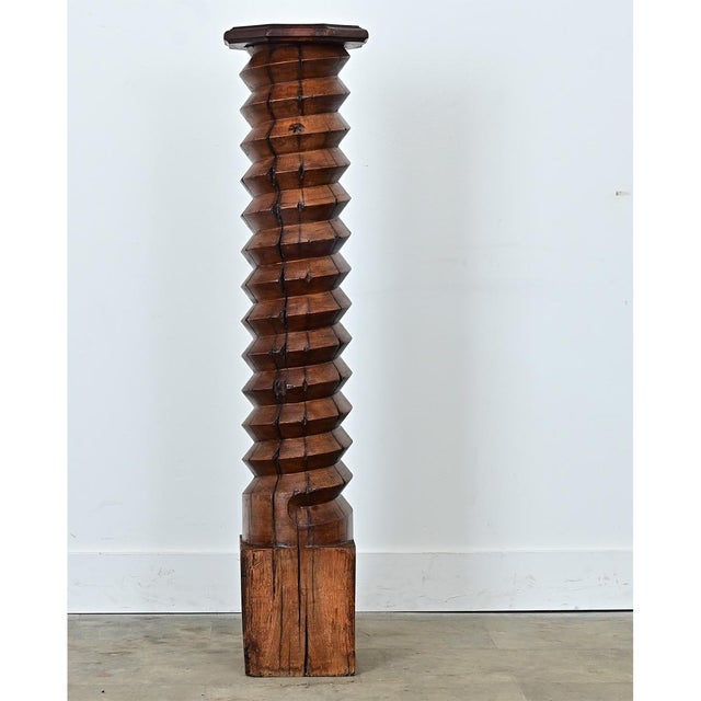 This wonderfully patinated grape press screw dates to 1770 and comes from a French winery. It is carved from a solid oak...